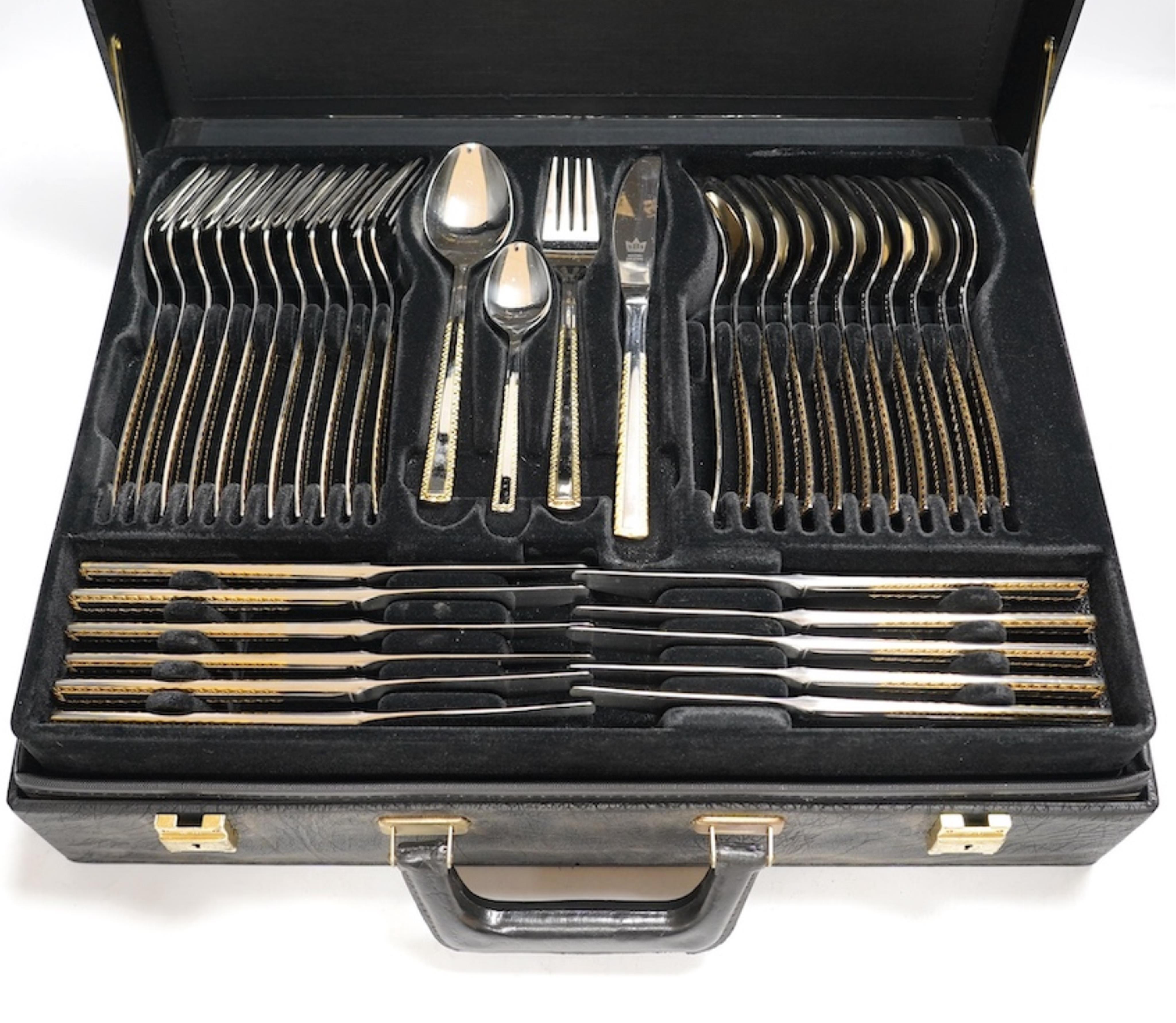 SBS Besteke, Solingen, a suite of plated cutlery. Condition - cutlery good, case in need of a clean